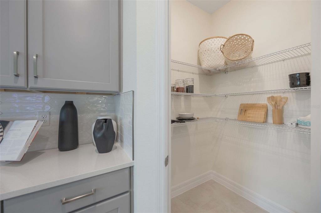 3952 Kennebunk Loop Mount Dora, FL 32757 - Photo 21 of 36 a kitchen with a sink and cabinets