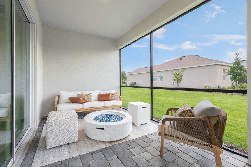 3952 Kennebunk Loop Mount Dora, FL 32757 - Photo 34 of 36 a outdoor space with patio the couches and pool
