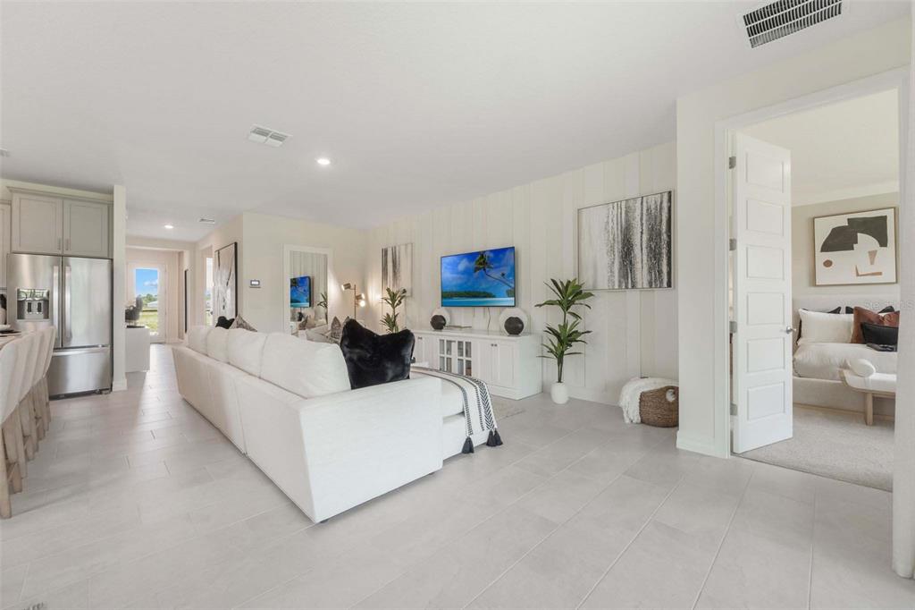 3952 Kennebunk Loop Mount Dora, FL 32757 - Photo 9 of 36 a living room with furniture white walls and white walls