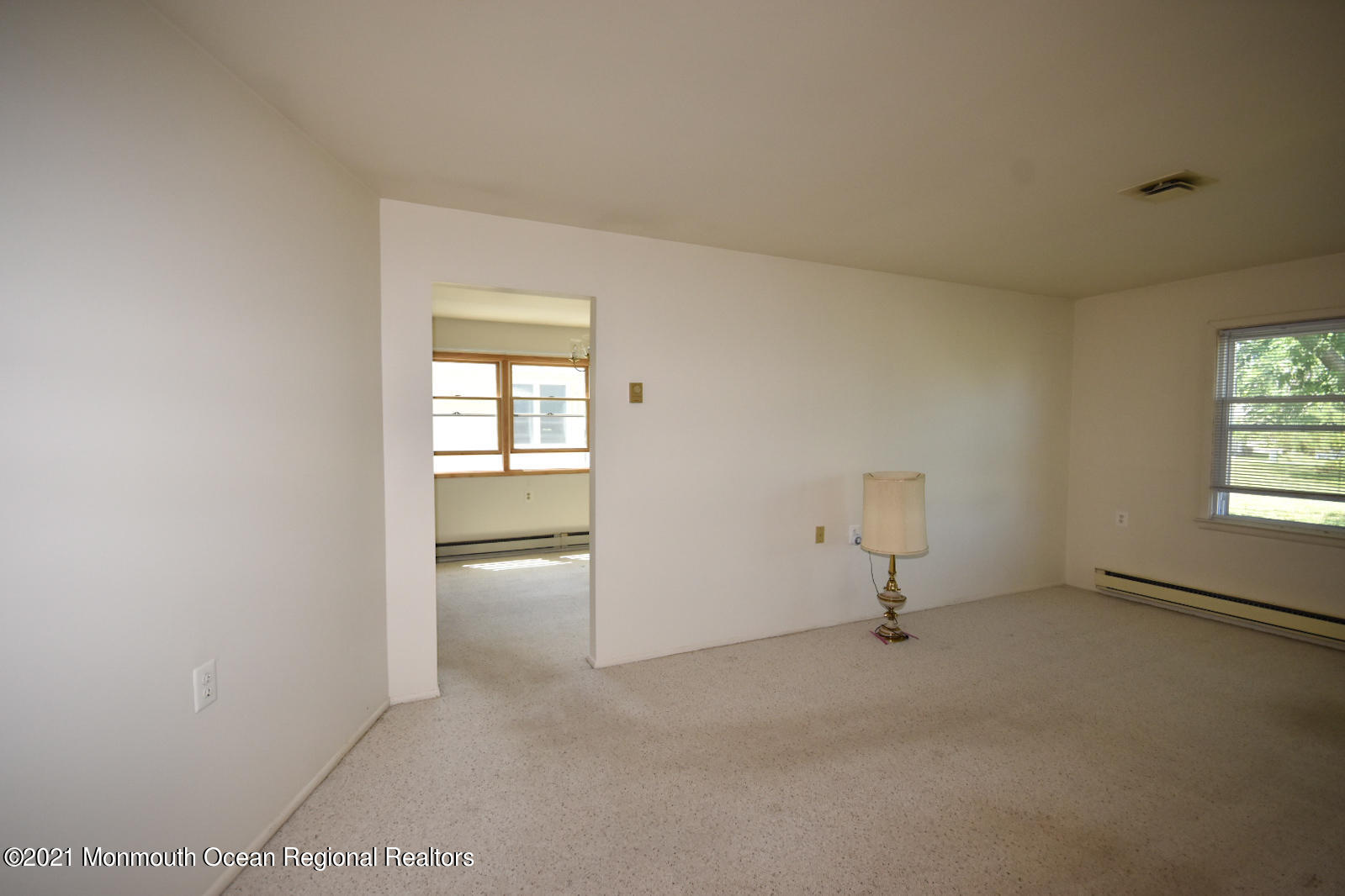 10 Lamb Road Brick, NJ 08724 - Photo 3 of 18 an empty room with windows and closet