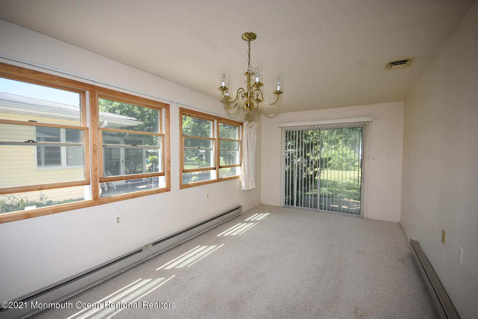 10 Lamb Road Brick, NJ 08724 - Photo 4 of 18 a view of an empty room with a window