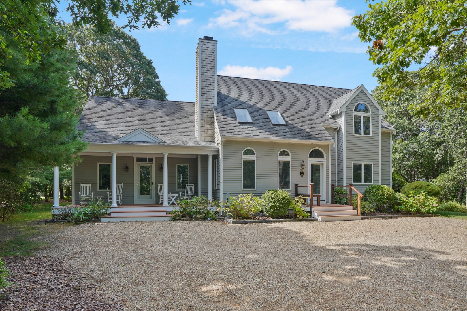 12 Duarte Circle Edgartown, MA 02539 - Photo 1 of 43 a front view of a house with garden