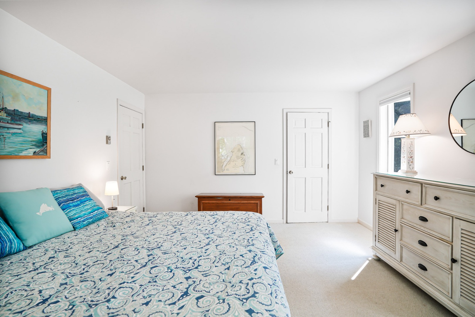 12 Duarte Circle Edgartown, MA 02539 - Photo 19 of 43 a bedroom with a bed and a dresser