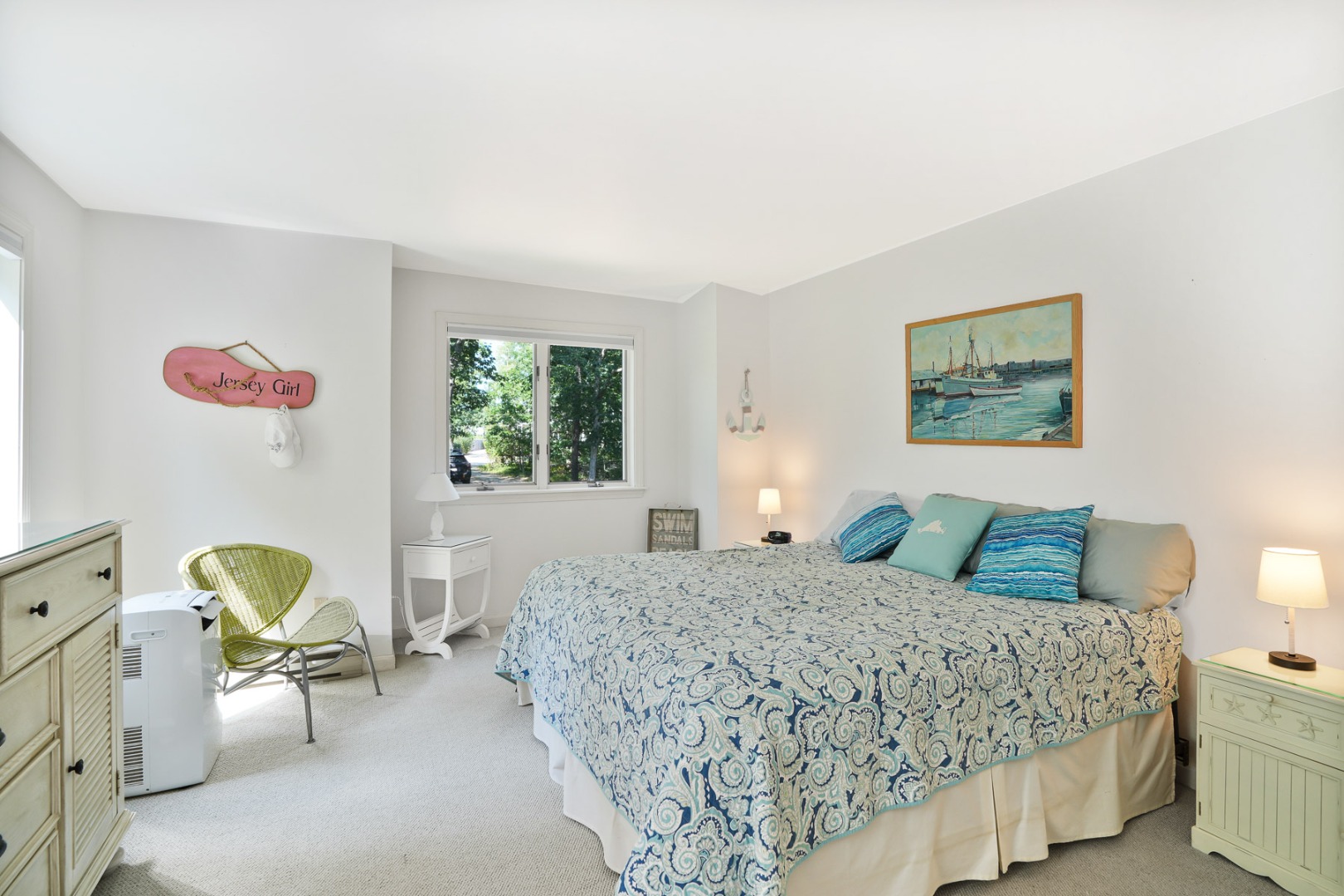 12 Duarte Circle Edgartown, MA 02539 - Photo 20 of 43 a bedroom with a bed a couch and a window