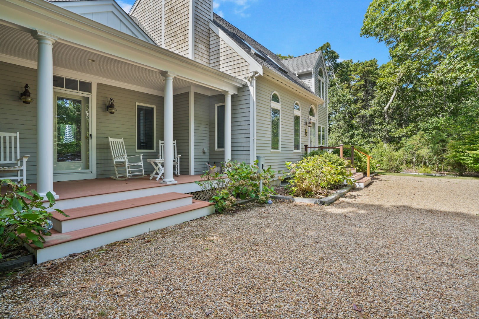 12 Duarte Circle Edgartown, MA 02539 - Photo 2 of 43 a front view of a house with a yard
