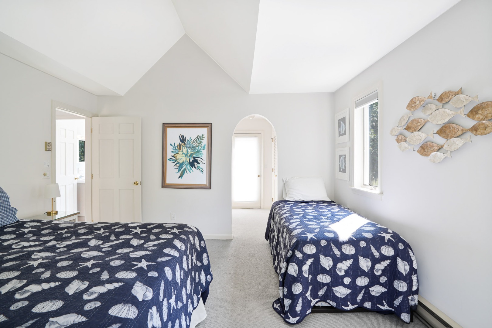 12 Duarte Circle Edgartown, MA 02539 - Photo 24 of 43 a bedroom with two beds and a window