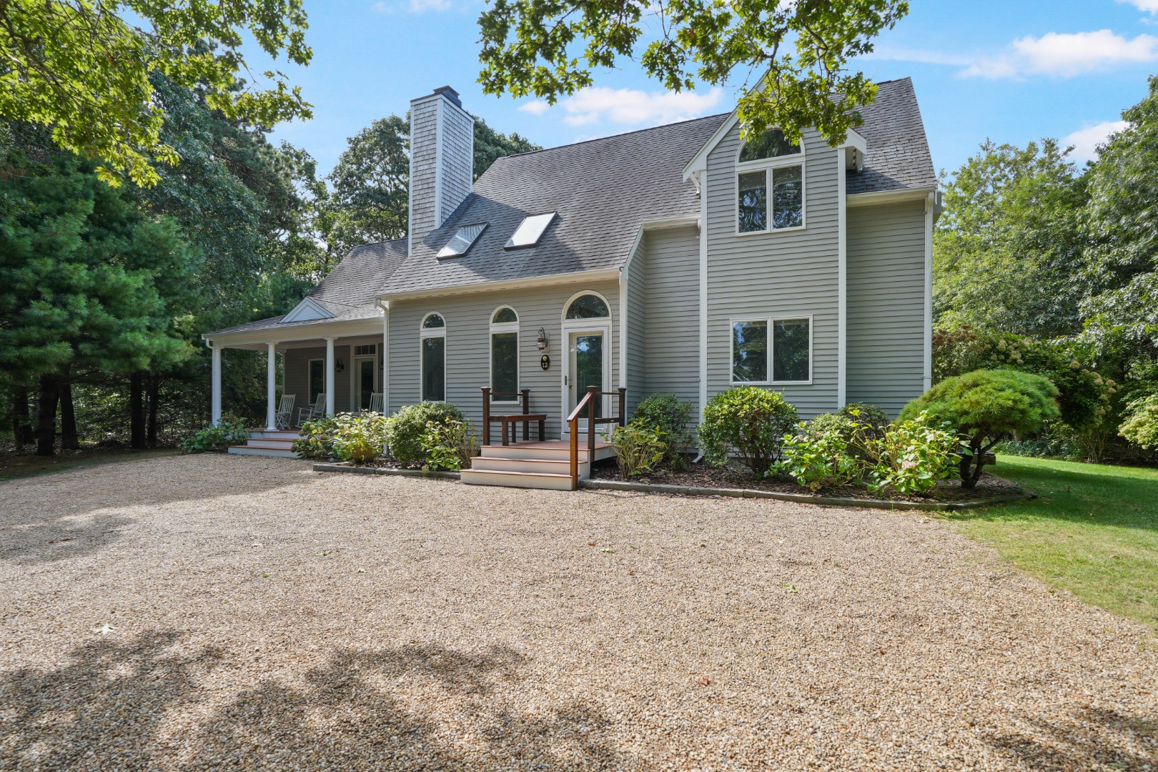 12 Duarte Circle Edgartown, MA 02539 - Photo 40 of 43 front view of a house with a yard