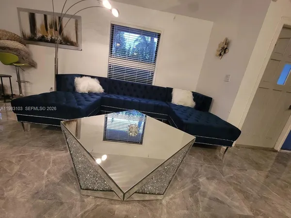 a large pool that has couches in it