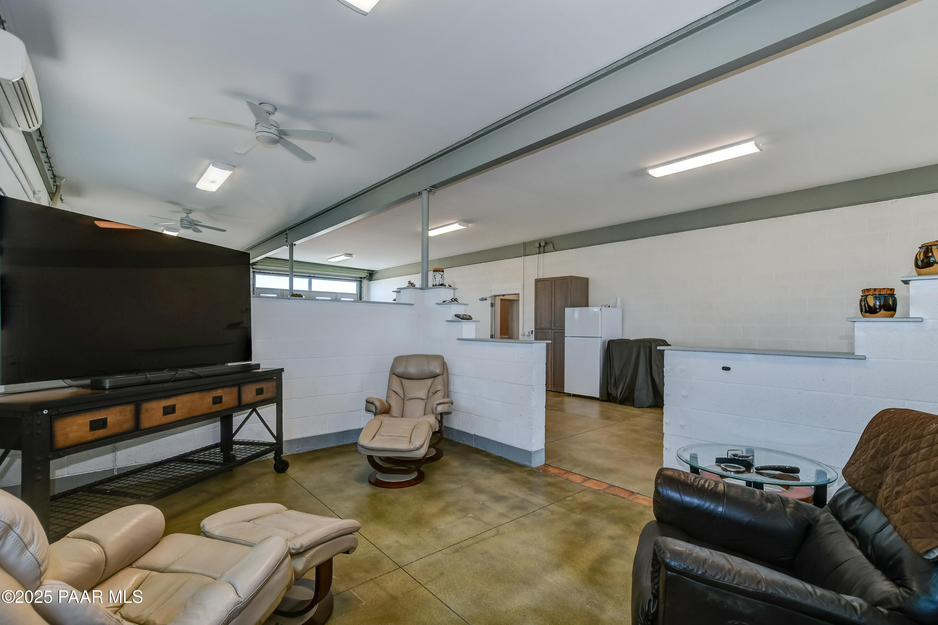 3200 West Rugged Spirit Trail Prescott, AZ 86305 - Photo 11 of 48 a living room with furniture and a flat screen tv
