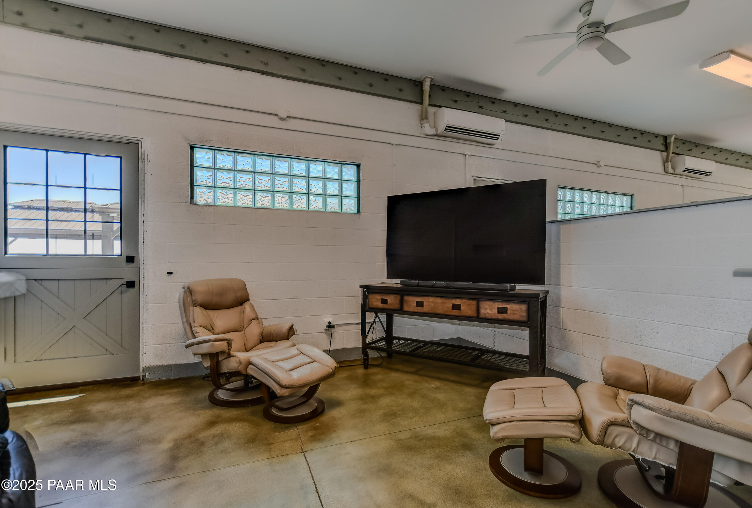 3200 West Rugged Spirit Trail Prescott, AZ 86305 - Photo 12 of 48 a living room with furniture and a flat screen tv