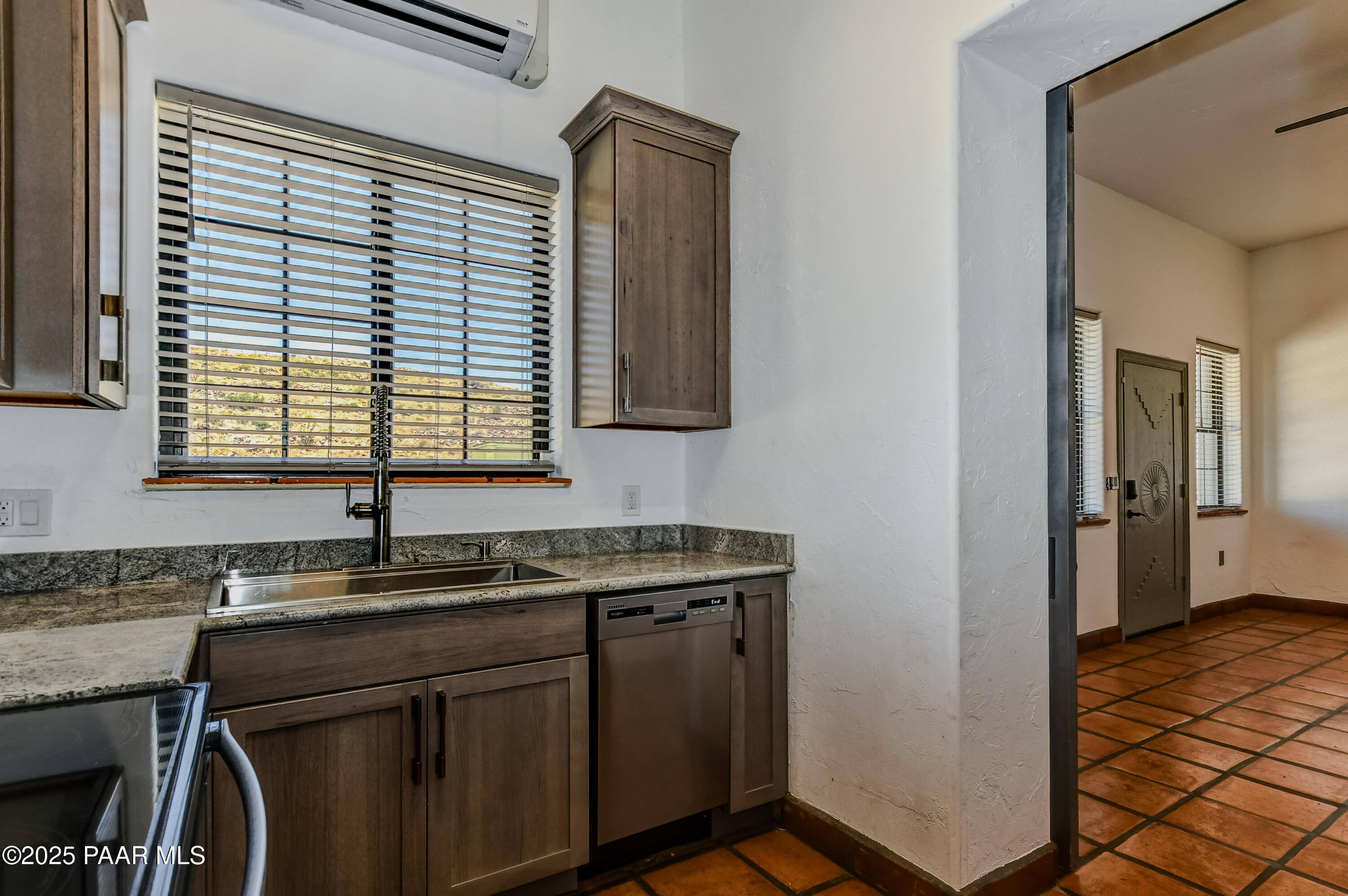 3200 West Rugged Spirit Trail Prescott, AZ 86305 - Photo 17 of 48 a kitchen with a sink cabinets and window