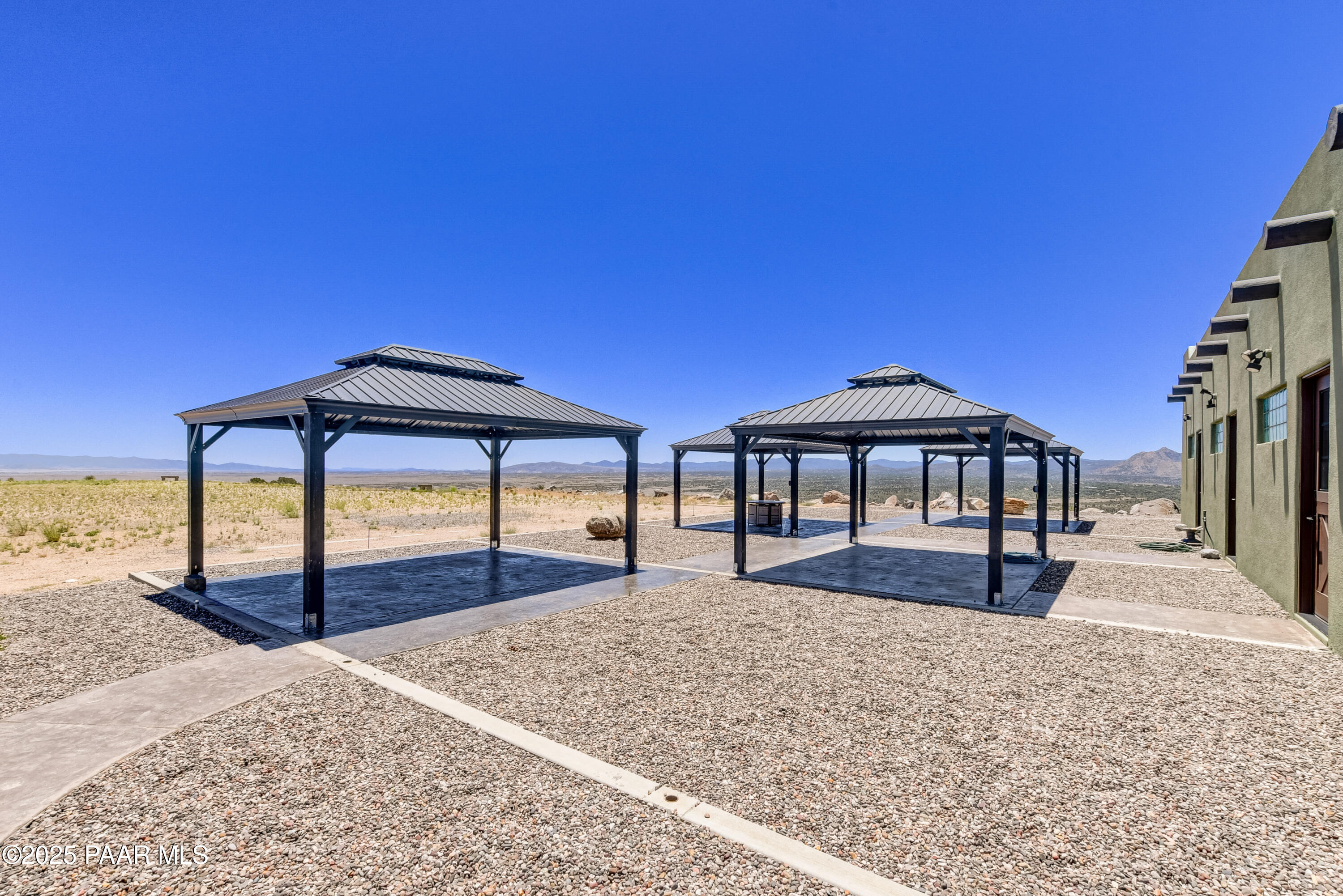 3200 West Rugged Spirit Trail Prescott, AZ 86305 - Photo 40 of 48 a front view of a house with a yard