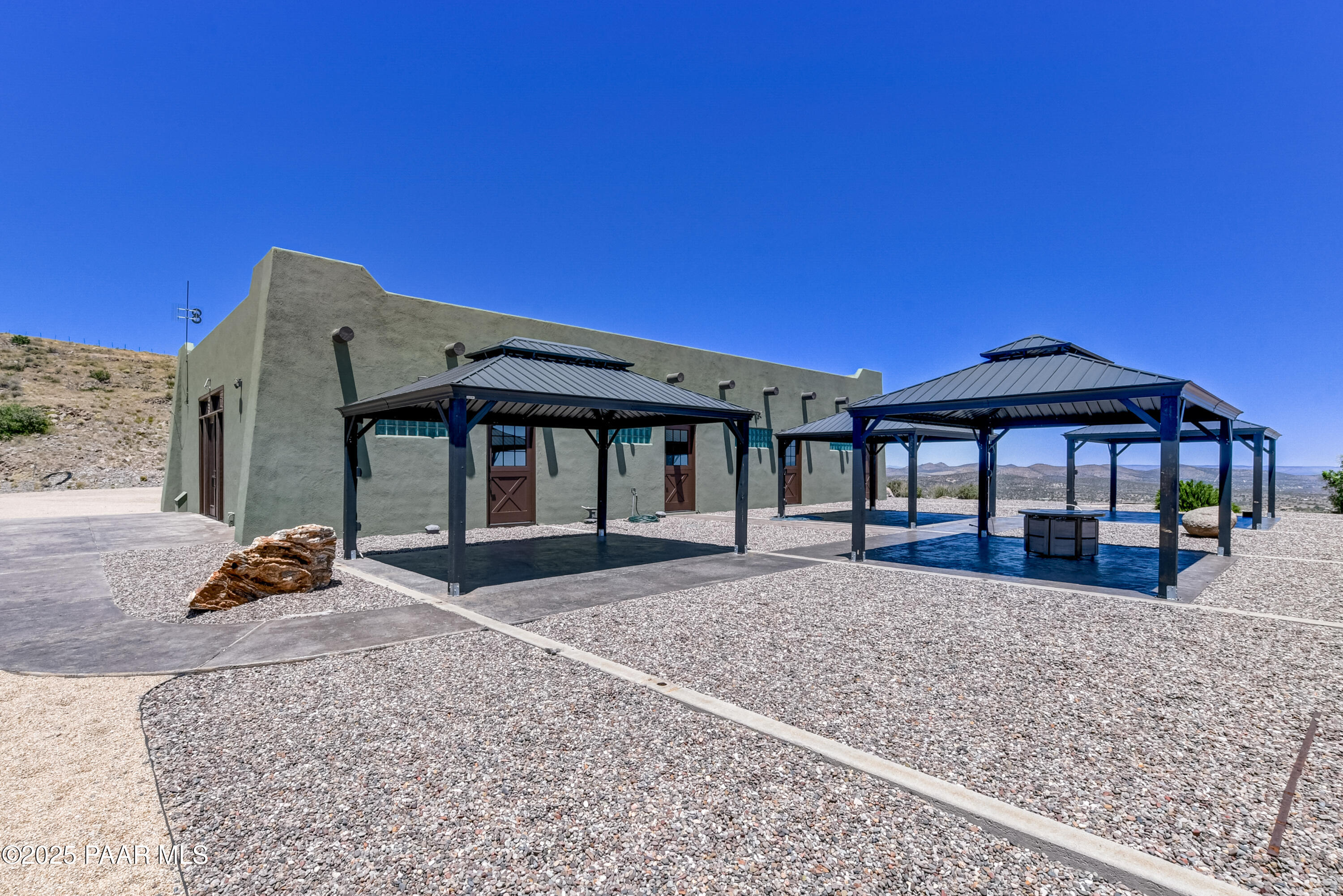 3200 West Rugged Spirit Trail Prescott, AZ 86305 - Photo 5 of 48 a view of a house with a yard and balcony