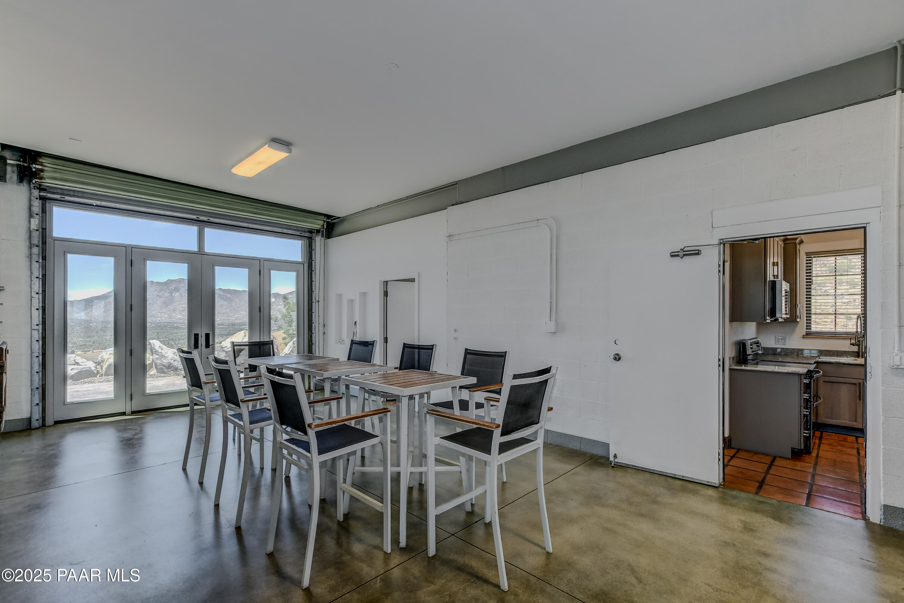 3200 West Rugged Spirit Trail Prescott, AZ 86305 - Photo 9 of 48 a view of a dining room with furniture window and wooden floor