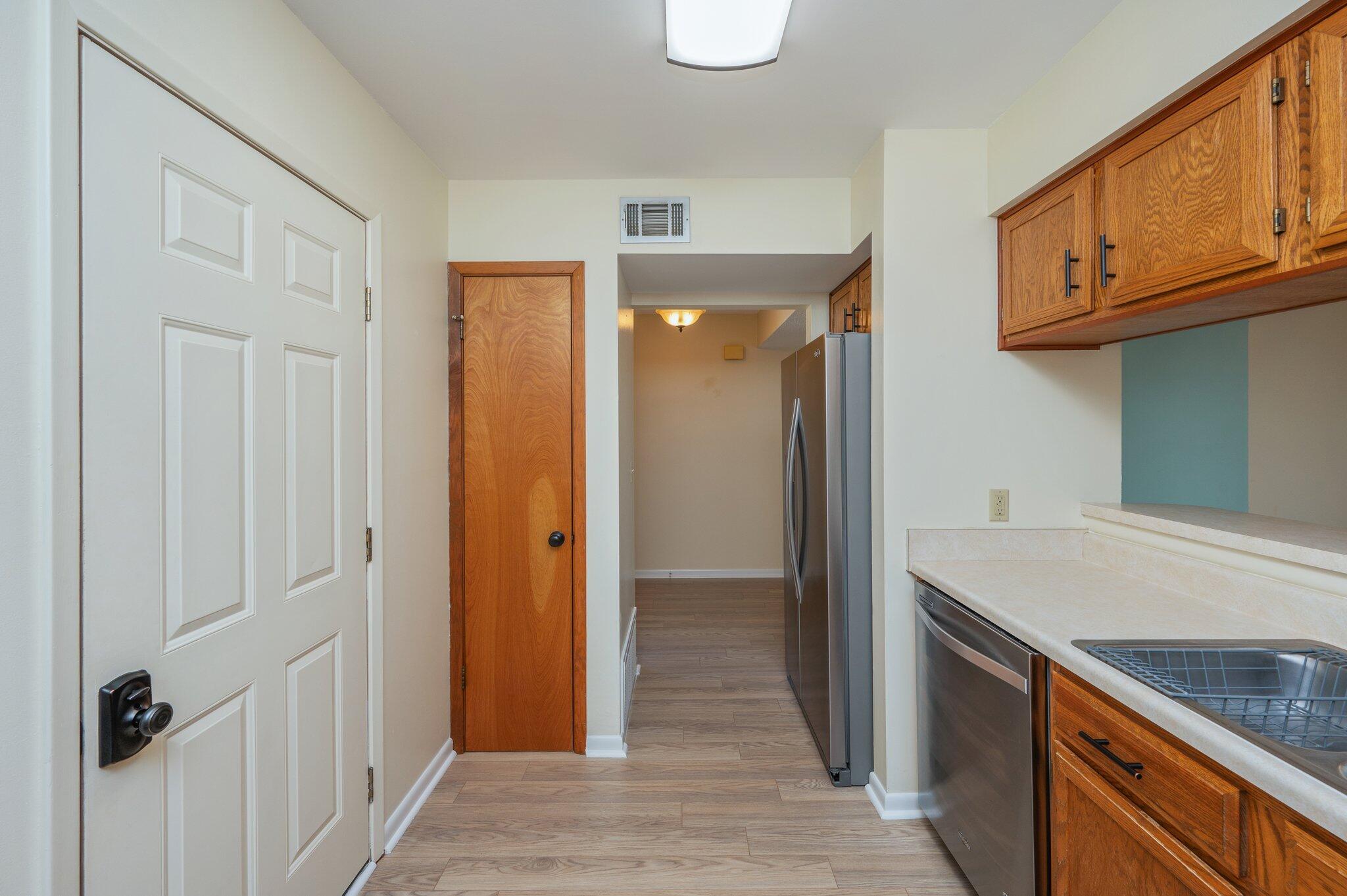 101 Cedar Ridge Way Niceville, FL 32578 - Photo 14 of 33 a kitchen with stainless steel appliances granite countertop a refrigerator and a sink