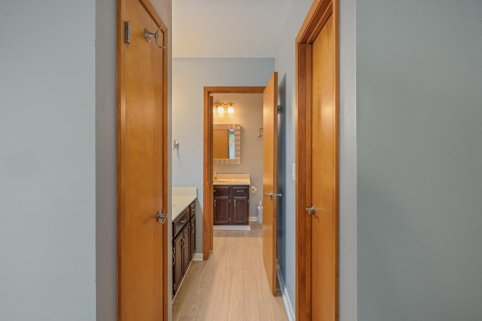 101 Cedar Ridge Way Niceville, FL 32578 - Photo 18 of 33 a view of a bathroom from a hallway