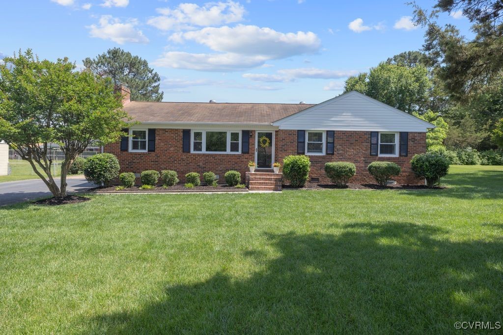 3511 Respess Road Midlothian, VA 23112 - Photo 1 of 40 a front view of a house with garden
