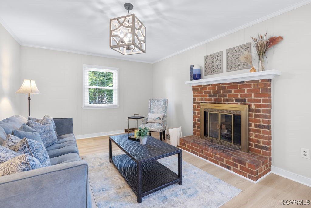 3511 Respess Road Midlothian, VA 23112 - Photo 12 of 40 a living room with furniture a fireplace and a window