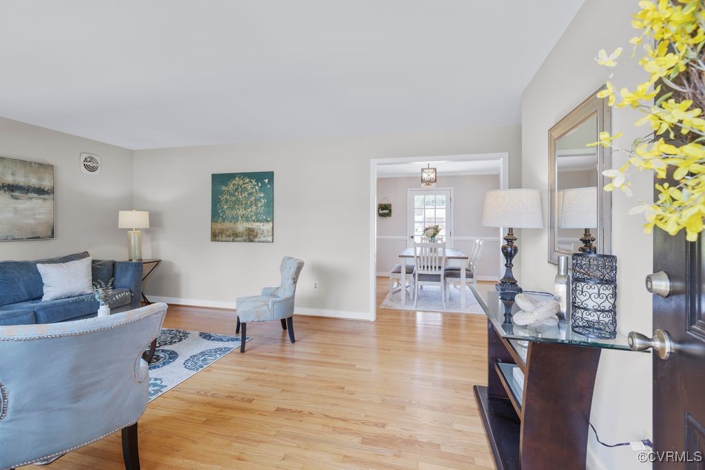 3511 Respess Road Midlothian, VA 23112 - Photo 5 of 40 a living room with furniture and a table