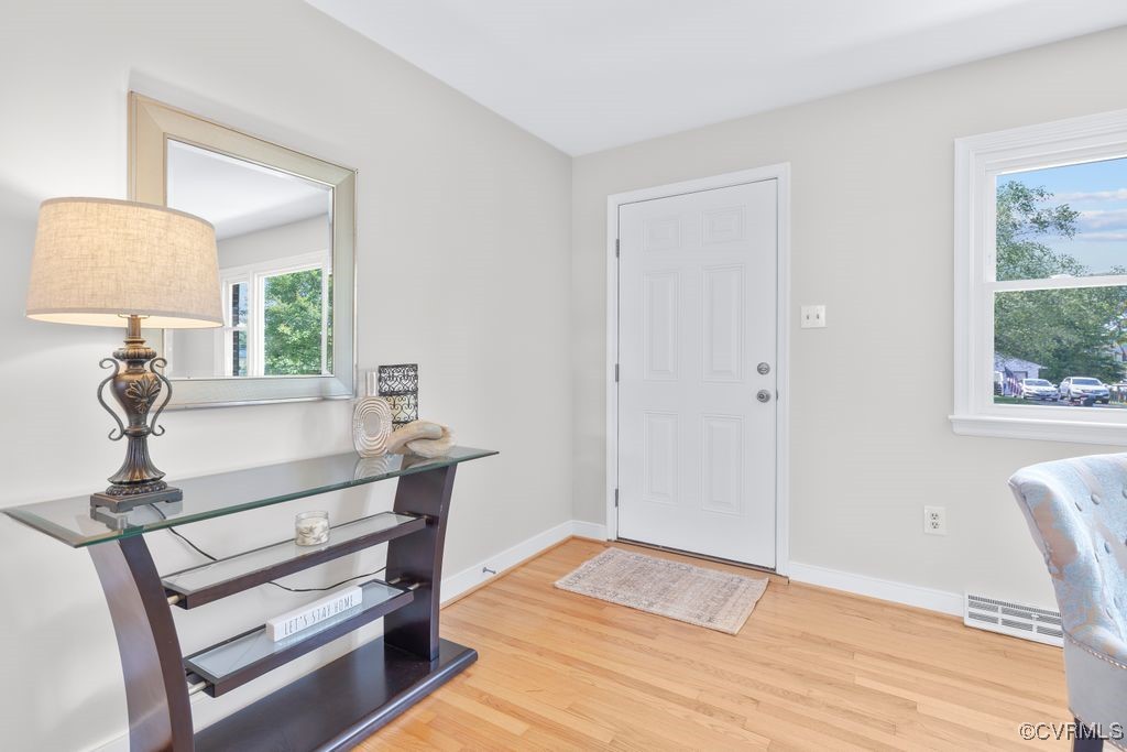 3511 Respess Road Midlothian, VA 23112 - Photo 7 of 40 a view of a room with wooden floor table and chair