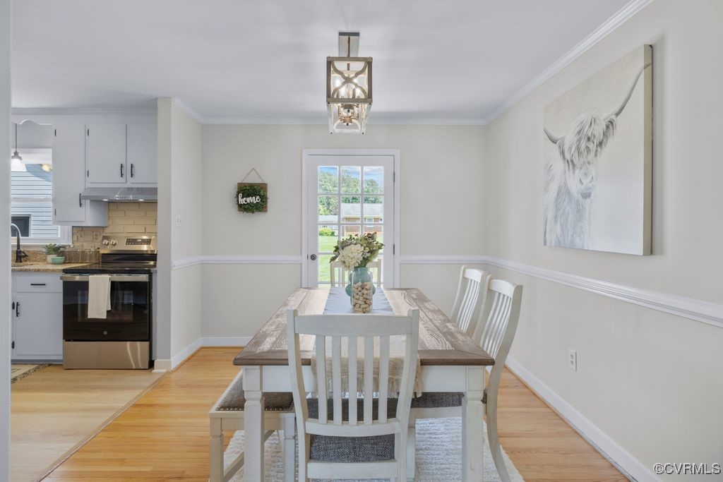 3511 Respess Road Midlothian, VA 23112 - Photo 8 of 40 a view of a dining room with furniture window and wooden floor