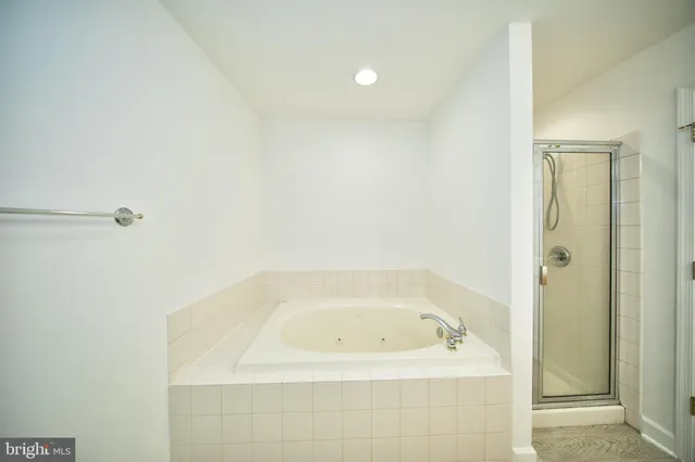 a front view of a building with traffic signal lights