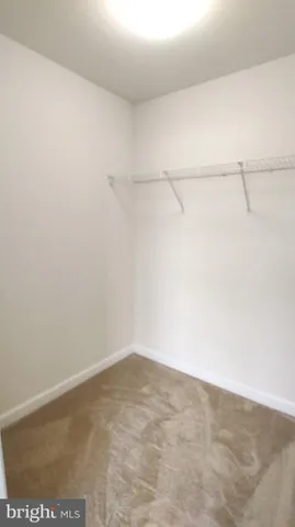 an empty room with an entryway