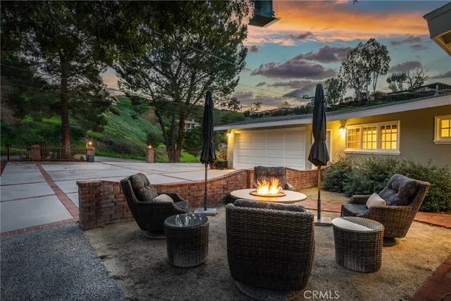 a kitchen with a sink stove and refrigerator