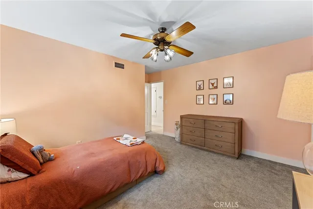an aerial view of a residential houses with city view