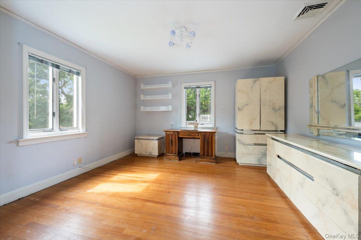 1 Parkside Drive Great Neck, NY 11021 - Photo 18 of 30 Unfurnished office with light wood-style floors and crown molding