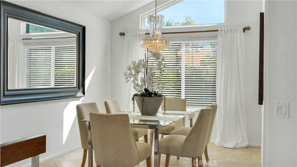 7 Nantucket Irvine, CA 92620 - Photo 12 of 55 a view of a dining room with furniture and windows