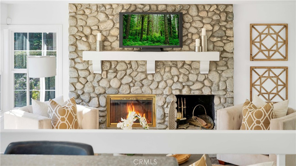 7 Nantucket Irvine, CA 92620 - Photo 24 of 55 a view of living room with furniture and a fireplace