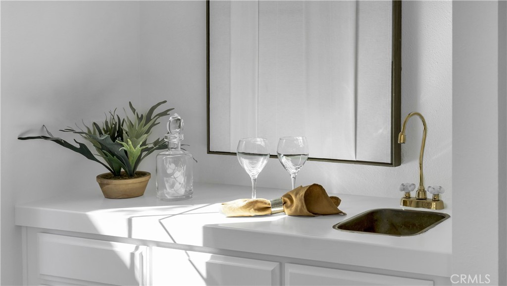 7 Nantucket Irvine, CA 92620 - Photo 26 of 55 a bathroom with a sink and a mirror