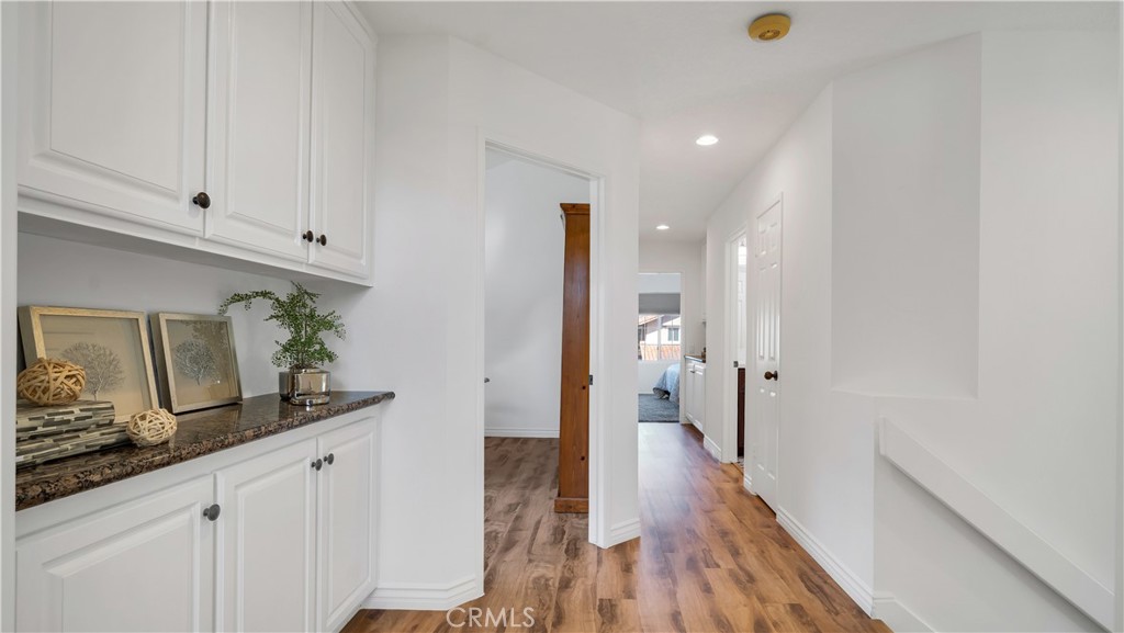 7 Nantucket Irvine, CA 92620 - Photo 29 of 55 a hallway with view of living room
