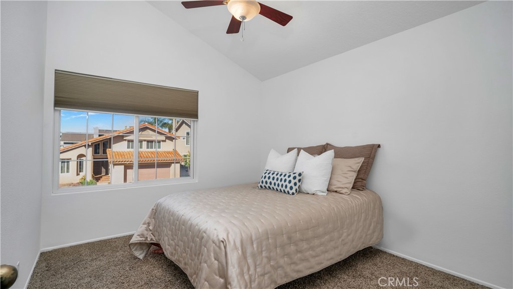 7 Nantucket Irvine, CA 92620 - Photo 33 of 55 a bedroom with a bed and window