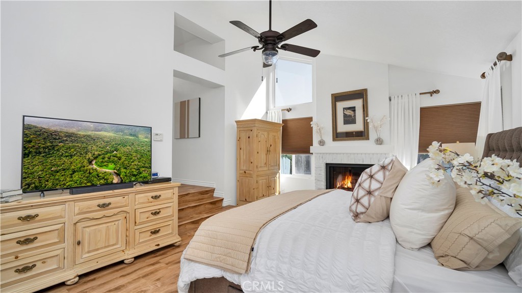 7 Nantucket Irvine, CA 92620 - Photo 38 of 55 a bedroom with a bed and a flat screen tv