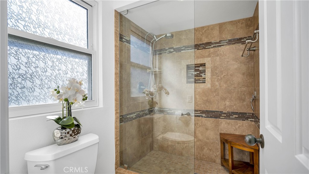 7 Nantucket Irvine, CA 92620 - Photo 44 of 55 a bathroom with a shower