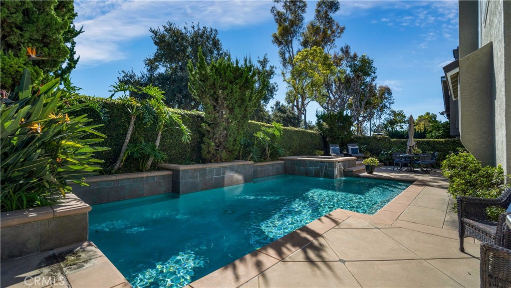 7 Nantucket Irvine, CA 92620 - Photo 49 of 55 a view of backyard with swimming pool and seating