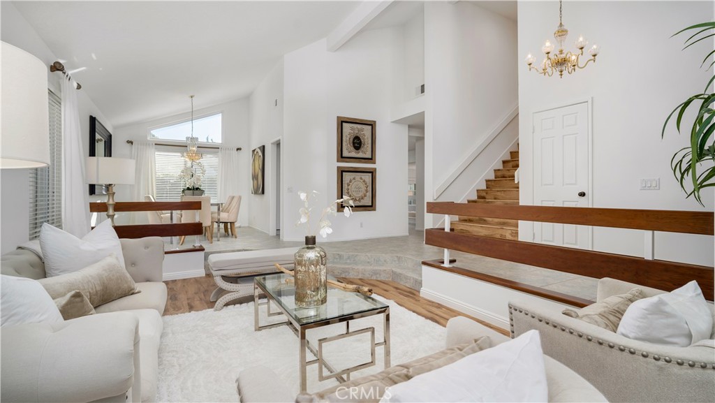 7 Nantucket Irvine, CA 92620 - Photo 8 of 55 a living room with furniture and wooden floor