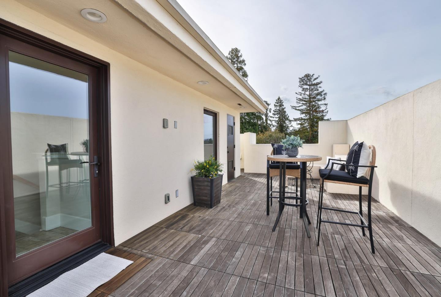 521 Fierro Loop Campbell, CA 95008 - Photo 22 of 24 a view of a dining room with furniture and wooden floor
