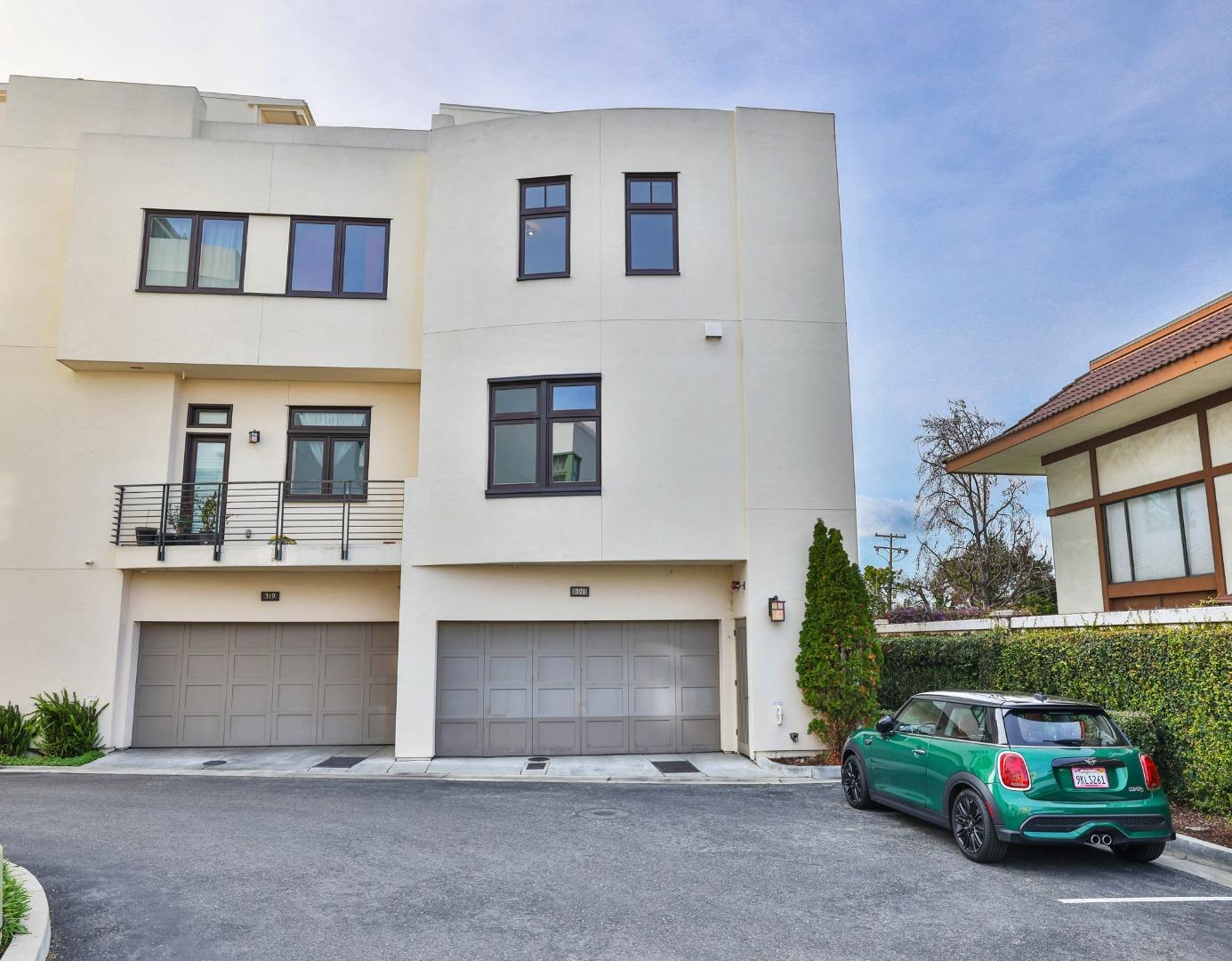 521 Fierro Loop Campbell, CA 95008 - Photo 24 of 24 a car parked in front of a brick house