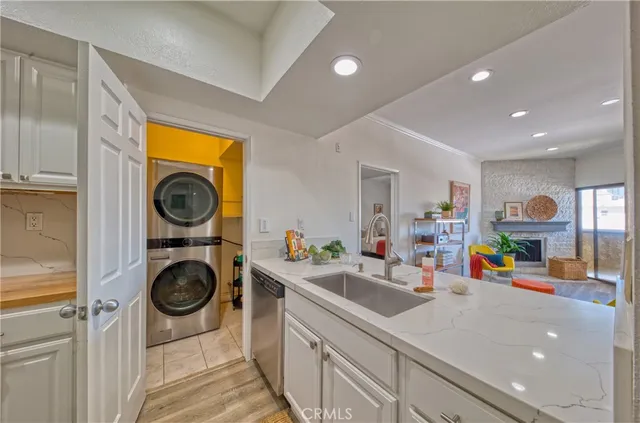 a view of living room with washer and dryer