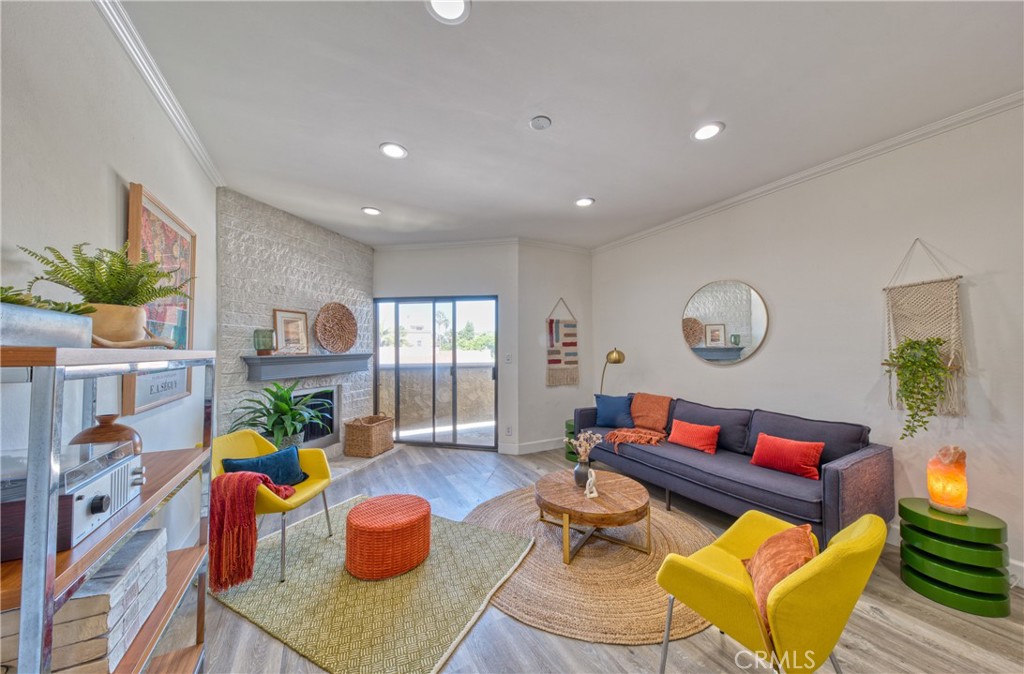 1665 Federal Avenue, Unit 302 Los Angeles, CA 90025 - Photo 2 of 31 a living room with furniture kitchen view and a window