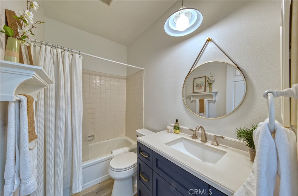 1665 Federal Avenue, Unit 302 Los Angeles, CA 90025 - Photo 30 of 31 a bathroom with a sink and a mirror