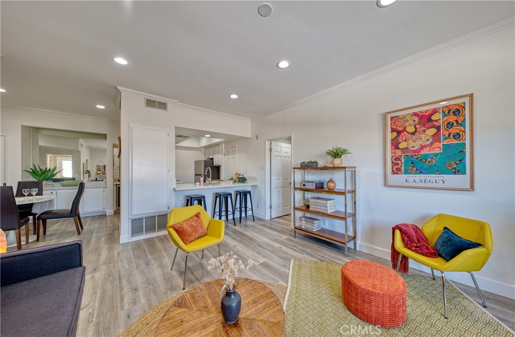 1665 Federal Avenue, Unit 302 Los Angeles, CA 90025 - Photo 6 of 31 a living room with furniture gym equipment and a rug