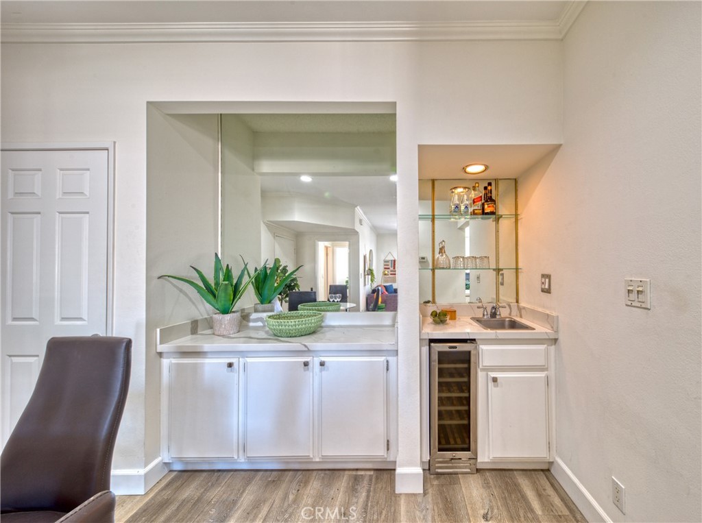 1665 Federal Avenue, Unit 302 Los Angeles, CA 90025 - Photo 10 of 31 a dining room with furniture and wooden floor