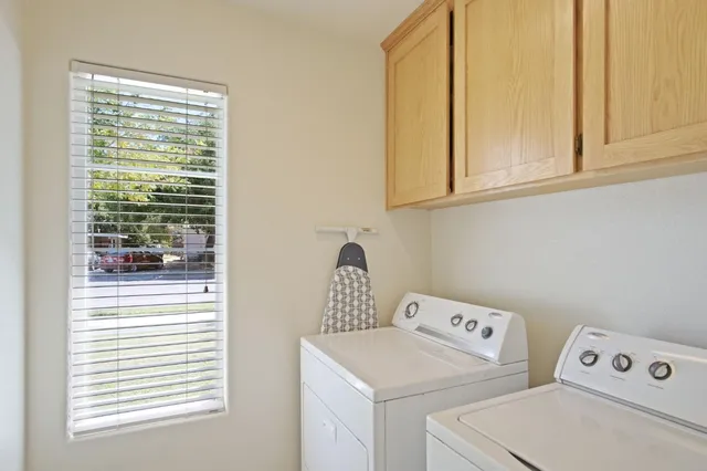 a view of bathroom with washing machine
