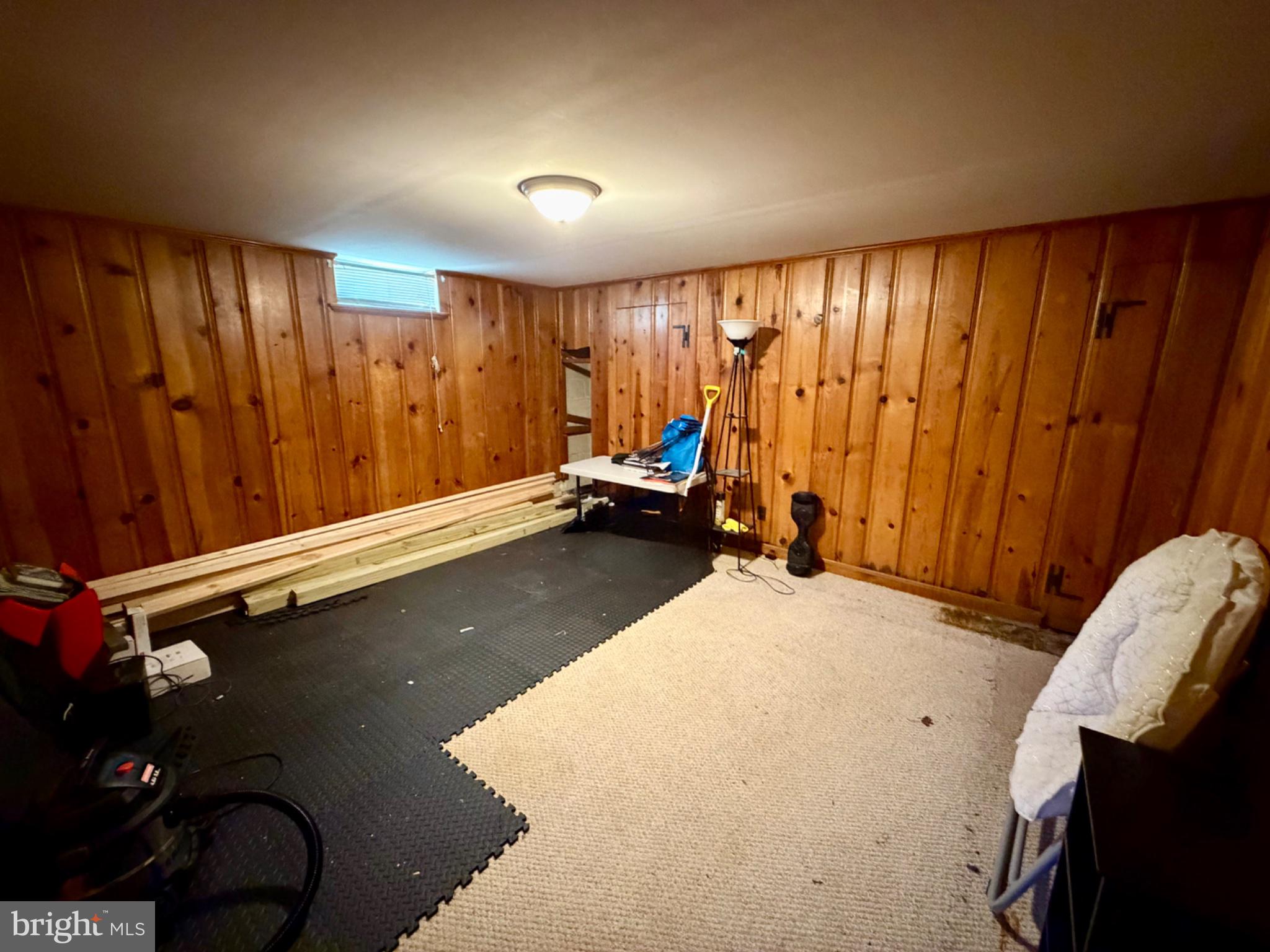 601 Braeside Road Baltimore, MD 21229 - Photo 13 of 19 a view of a room with gym equipment