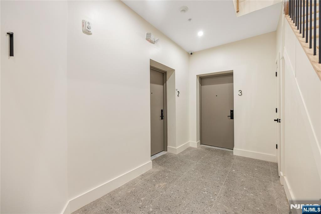10 School Street, Unit 2 Passaic, NJ 07055 - Photo 9 of 11 a view of hallway with a hallway
