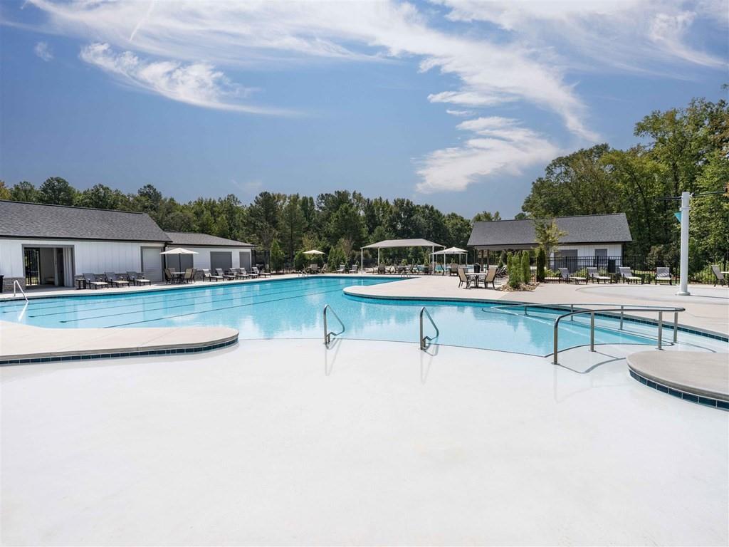 133 Pyramid Lane, Unit THC1 Hoschton, GA 30548 - Photo 13 of 20 a view of a lake with outdoor seating